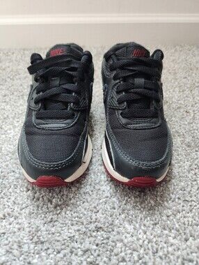 Nike Kids Black Sneakers with Pink Accents